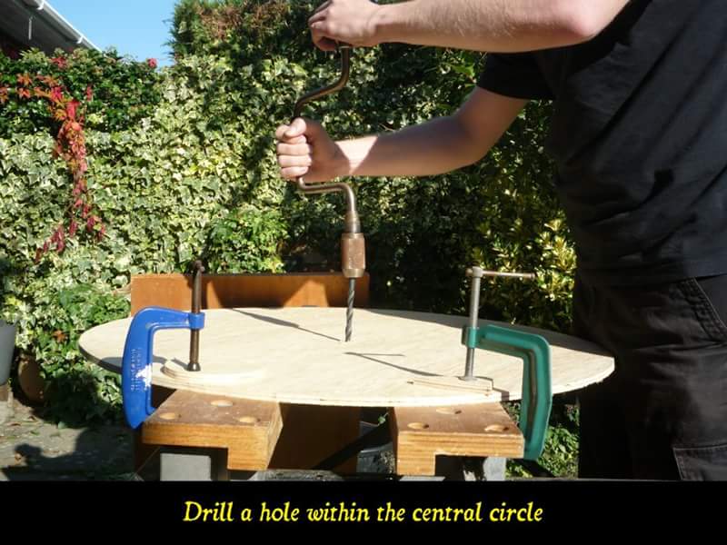 Drill a hole within the central circle