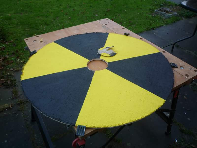 Shield construction image showing painted shield blank (no text)