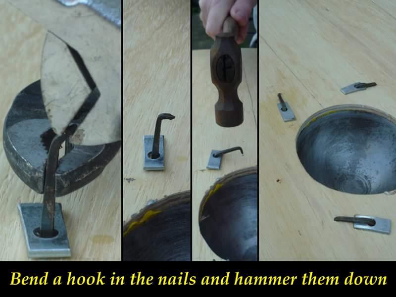 Bend a hook in the nails and hammer them down